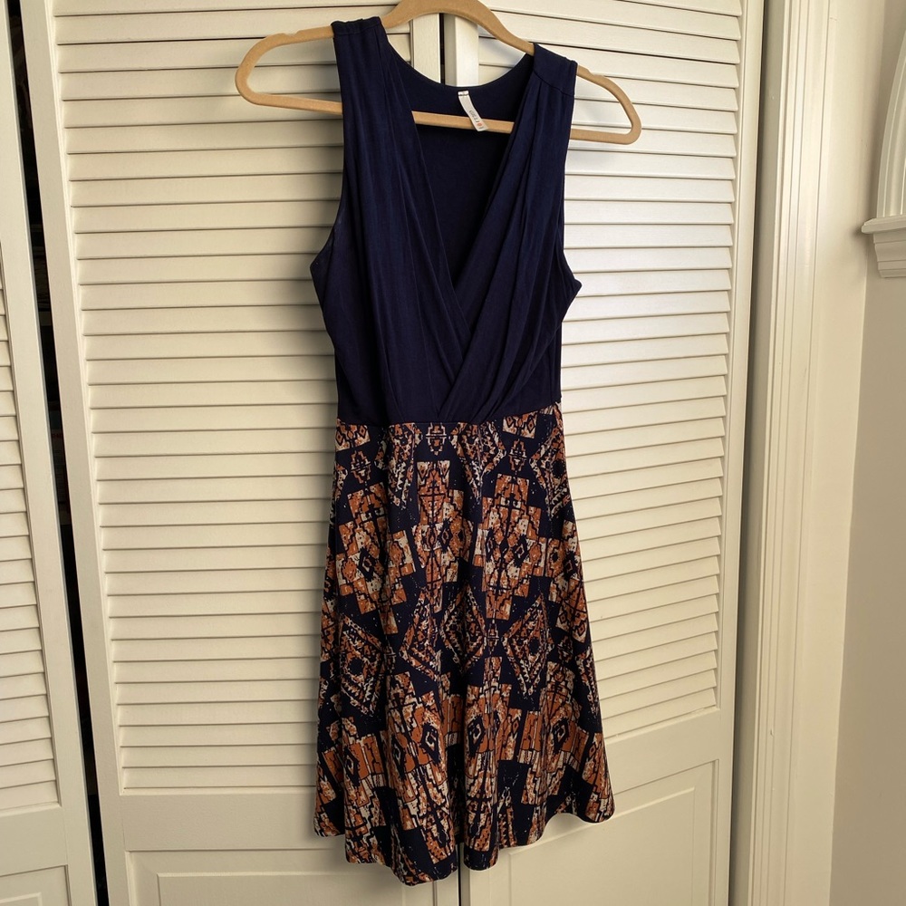 Navy blue and patterned dress.